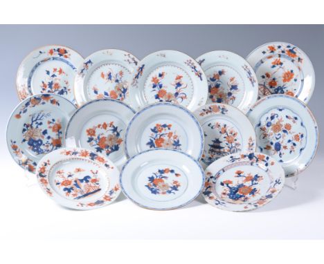 Eight Chinese Imari plates, Kangxi (1662-1722), painted with peonies and chrysanthemums with gilt highlights, 23cm diameter; 