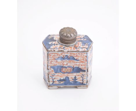 A Chinese Imari tea canister, Kangxi, of canted rectangular form, painted in underglaze blue with pagodas and mountains, with