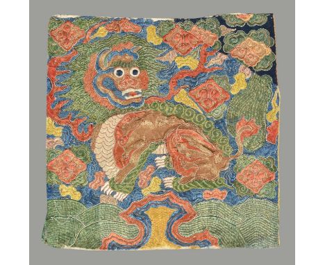 A rare Chinese embroidered rank badge, buzi, 17th century, depicting a lion, from the group of badges known as the Corsini co