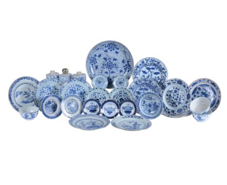 Three Chinese blue and white tea caddies, Kangxi, of canted rectangular form and painted with panels of flowers, each approxi
