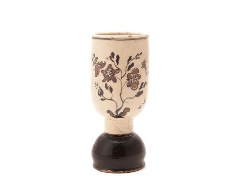 A Chinese cizhou-type cylindrical vessel, painted with a peony bush on one side with butterfly and bird in flight, on the rev