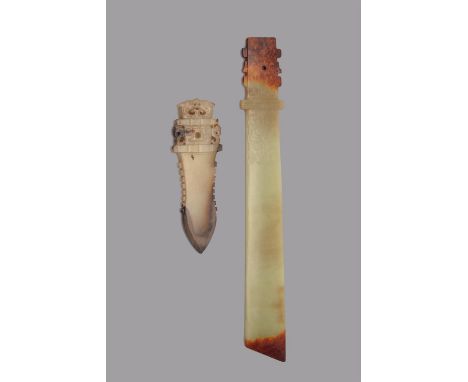 Two Chinese archaic-style jade blades, one thinly carved with a pair of protruding flanges to either side of the tang, drille