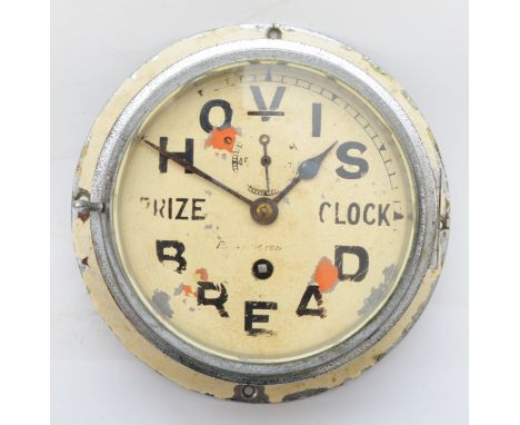 A Hovis bread company 8 day wall clock, 20cm. 