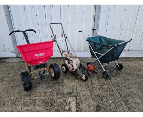 a Little Wonder petrol deluxe garden edge trimmer, Briggs and Stratton engine, an Earthway ev-n-spred garden grass seed sprea