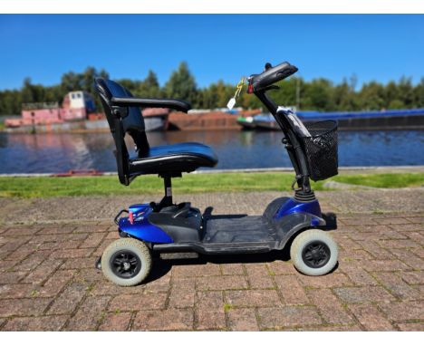 A Strider SD#1 mobility scooter, with instructions and power pack 