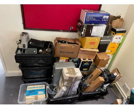 A large collection of projector equipment. 