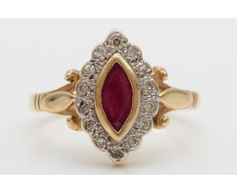 A 9ct gold marquise cut ruby and diamond ring, P, 3.6gm.Condition report - light signs of wear with marks and scratches to th