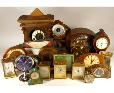 A collection of mid 20th century and later clocks, to include mantel clocks, carriage clocks, desk clocks, wall clocks and ba