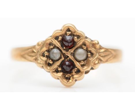 A 10k gold split pearl and garnet children's ring, D, 0.5gm. 