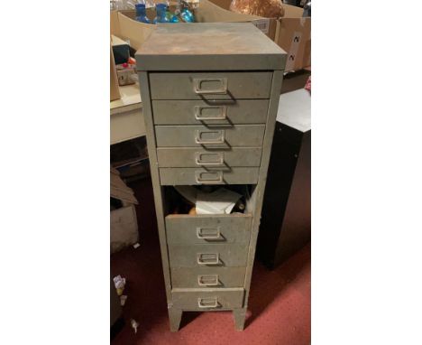 A steel filing cabinet and contents, including carpenters hand tools, 100cm tall. 