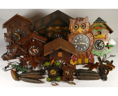 A collection of manual wind cuckoo and novelty wall clocks, for spares or repair. 
