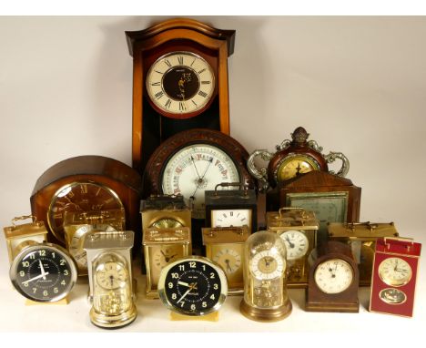 A collection of mid 20th century and later clocks, to include mantel clocks, carriage clocks, desk clocks, wall clocks and ba