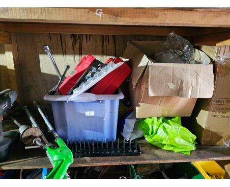 A shelf of garage tools 