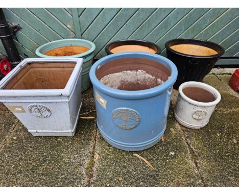 A pale blue Heritage Garden Pottery planter, diameter 37cm, two others by the same and three other planters 