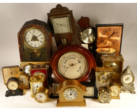 A collection of mid 20th century and later clocks, to include mantel clocks, carriage clocks, desk clocks, wall clocks and ba