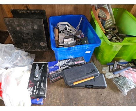 A shelf of tools, many unused. 