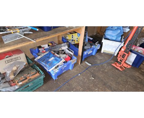 A shelf of tools, many unused. 