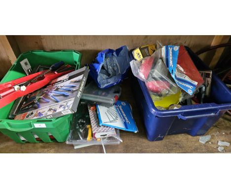 A shelf of tools, many unused. 