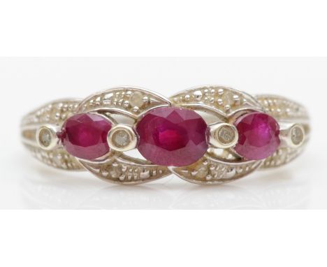 A 9ct white gold ruby and diamond ring, N-O, 2.2gm. 