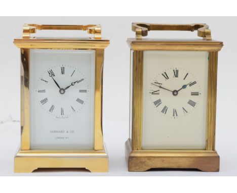 A Garrard &amp; Co brass cased 8 day carriage clock, 12cm, together with another 8 day clock. 