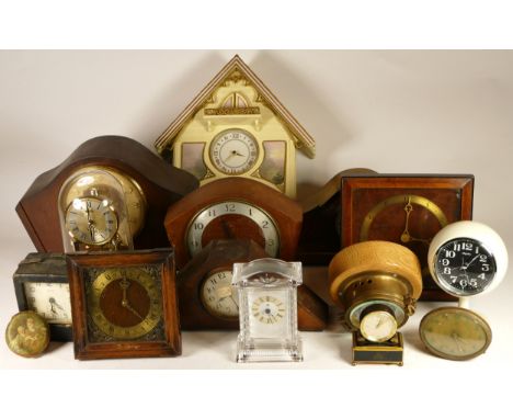 A collection of mid 20th century and later clocks, to include mantel clocks, carriage clocks, desk clocks, wall clocks and ba