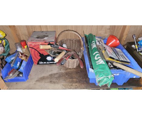 A shelf of tools, many unused. 