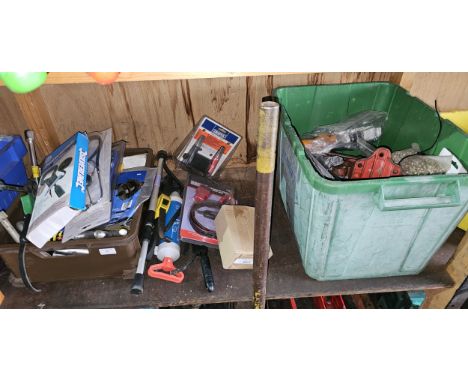 A shelf of tools, many unused. 