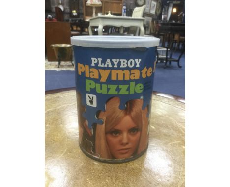 A COLLECTION OF VINTAGE PUZZLES, including a Playboy Playmate Puzzle and a Snoopy puzzle
