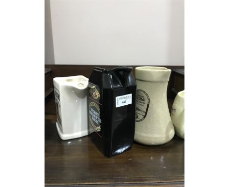GROUP OF CERAMIC WHISKY JUGS