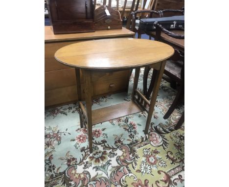 EDWARDIAN OAK OVAL OCCASIONAL TABLE, along with a table lamp