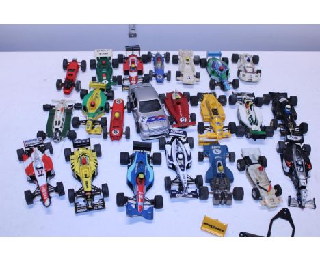 A box full of vintage slot cars 