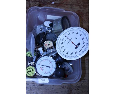 A box of assorted vintage gauges 