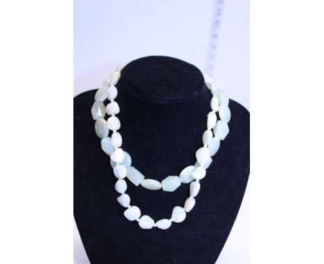 Two vintage necklaces with silver clasps 
