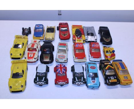 A box full of vintage slot cars 