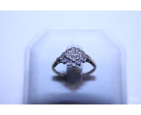 A hallmarked 9ct gold diamond cluster ring 