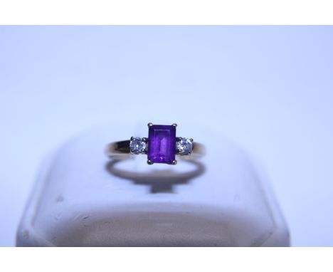 A 9ct gold amethyst and diamond ring 