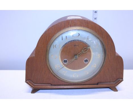 A vintage Smiths mantle clock with key and pendulum 