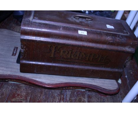 A vintage Triumph sewing machine, postage unavailable 
