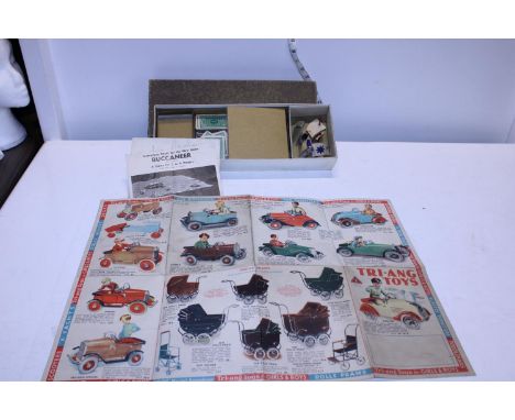 A vintage Tri-ang advertising poster and a boxed Buckineer game 