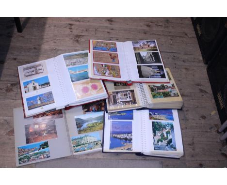Five albums full of vintage postcards and other ephemera 