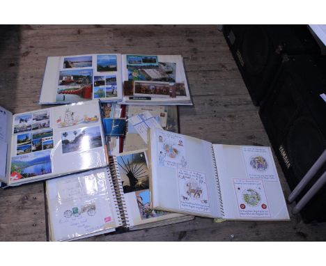 Five albums full of vintage postcards and other ephemera 