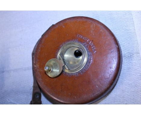 A vintage Chesterman leather cased tape measure 