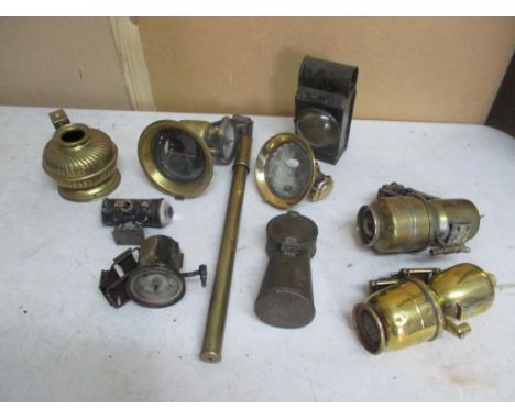 A group of bicycle and car lamps to include a Lucas lamp, an oil can and a bicycle pump 