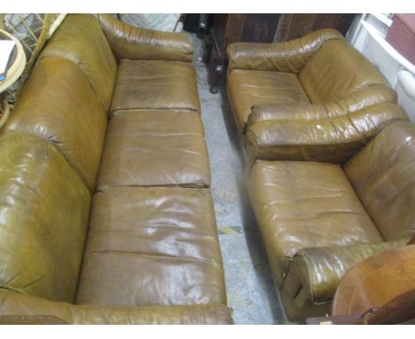 A mid century retro leather suite by Vatne Mobler consisting of a three seater sofa and two armchairsLocation: G 
