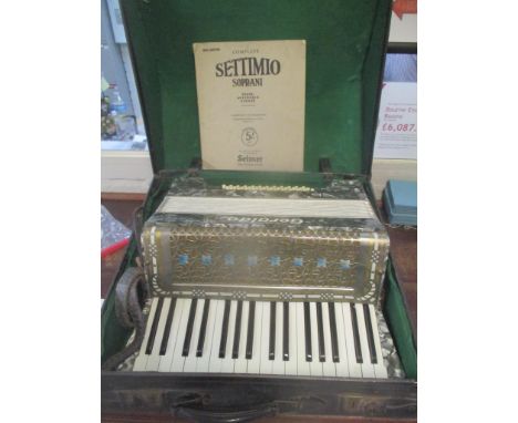 A Geraldo piano accordion in a case 