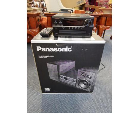 A Panasonic CD stereo system model number SC-PMX82EB-K, with original boxLocation: Rostrum 