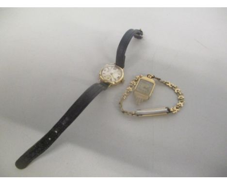 A 9ct gold ladies wristwatch together with a ladies Avia 9ct gold manual wind wristwatch