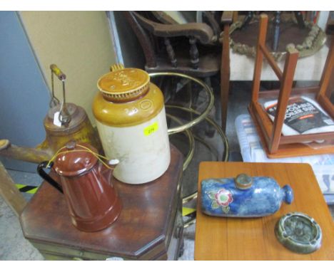 A Doulton stoneware hot water bottle, and an ashtray, a K P Works stoneware bottle, a Wells unbreakable portable lamp and an 