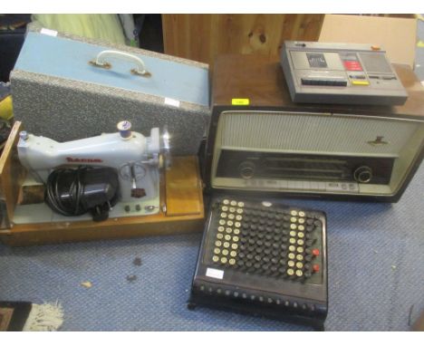 A Burroughs adding machine together with a Nord Mede radio, a Novum sewing machine and a WH Smith computer program data recor