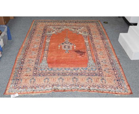 Tabriz silk prayer rug, circa 1870, the rust field with hanging lamp framed by upper spandrels and palmette borders, 195cm by